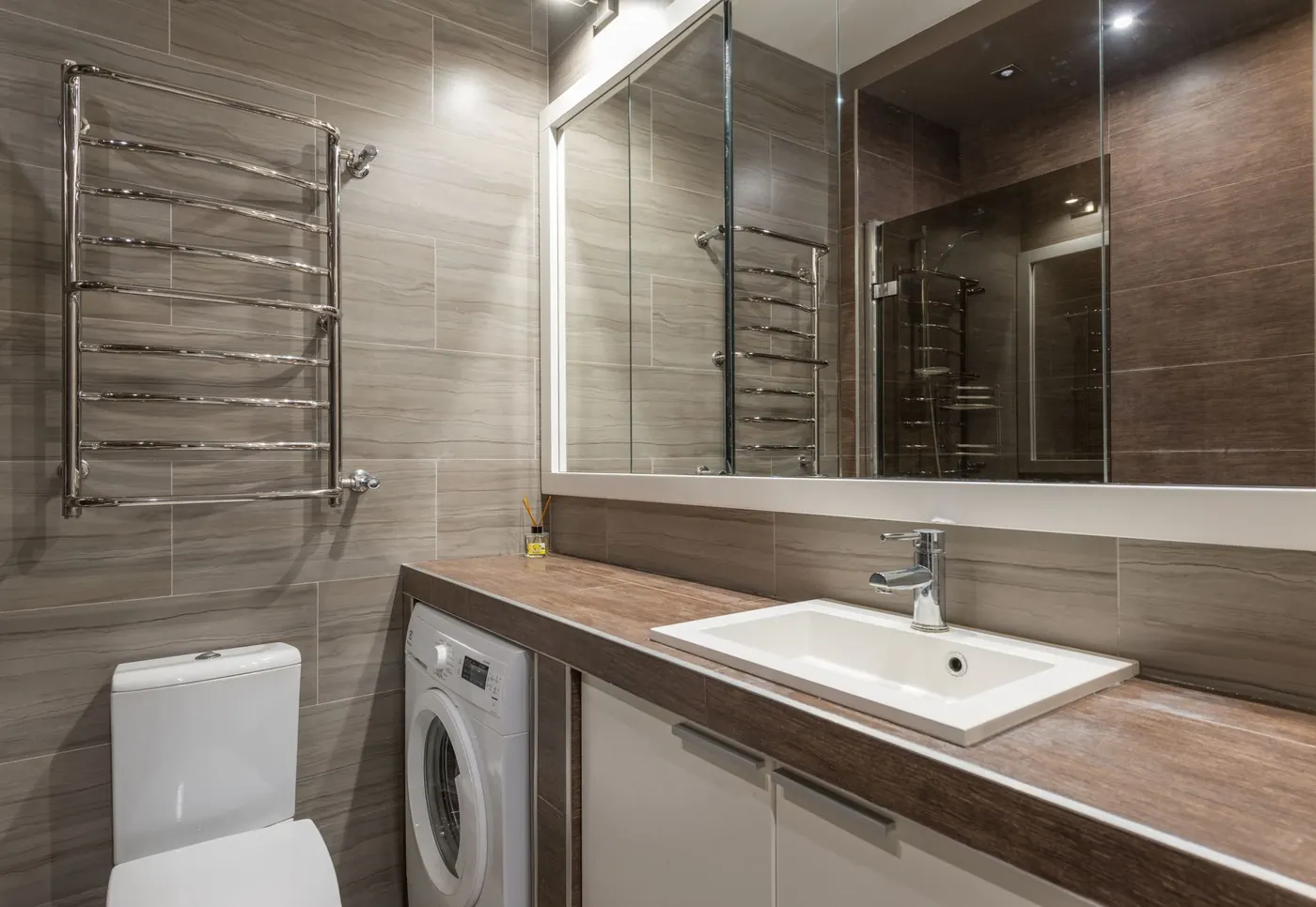 Rénovation de salle de bain avec pose de carrelage par Brunel TB